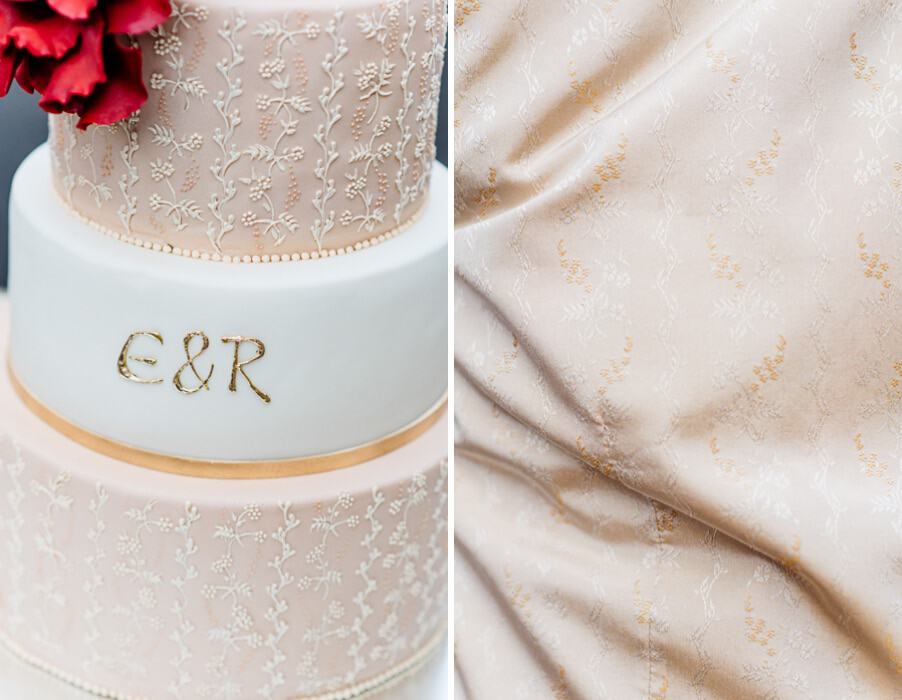 Kunstvolle Hochzeitstorte mit zarter Verzierung in blush und Weiß