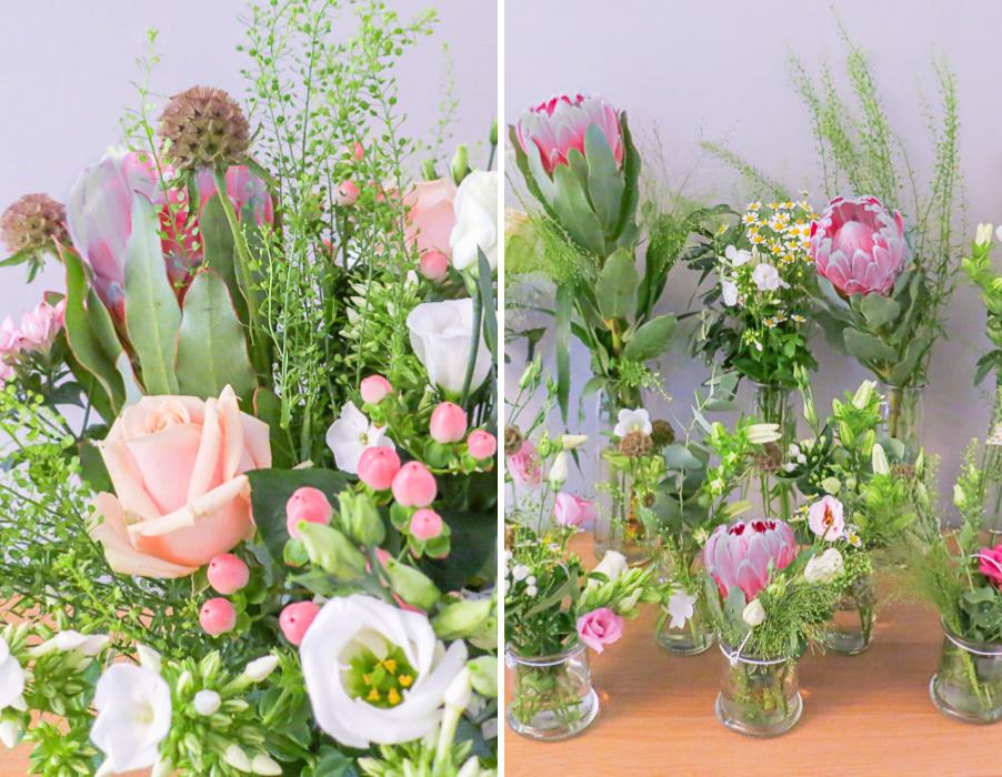 Hochzeit mit Protea. Blumen in einzelnen Vasen in Rosa und Weiß. Konzept von Hochzeitsgezwitscher